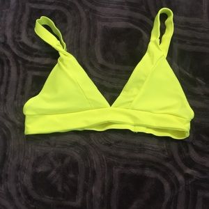 A neon yellow swimsuit top